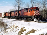 CP's London Pick-Up is viewed switching the industries on the Ayr Pit Spur in Ayr near the Greenfield Road crossing with C424's 4212, 4216 and RS-18u 1813. The train was heading eastbound on the Galt Subdivision towards Galt to lift and set-off cars for Toyota as well as working customers along the way as required. 