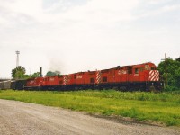 On a hot and hazy summer morning a CP eastbound slowly enters Quebec Street yard in London with a trio of C424's as well as a SD40-2 with a blanked-out cab. The units included; 4220, 4248, 4238 and 5478. CP 5478 is ex-Norfolk Southern 3246 and nee-Southern Railroad 3246. 