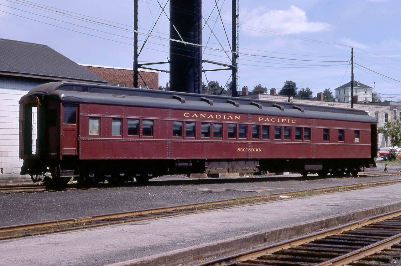 The Montreal section of the westbound Expo Limited included a set-off sleeper for Sudbury on Sunday, August 20, 1967.  SCOTSTOWN was the assigned car on Train 5 that morning.  S-2 7092 cut the car and placed it on a siding to await its return to Montreal at 10.45 that evening.  The CPR's Assignment of Space, Form 62-26, allocated it line number 520.  This was a convenient way to allow passengers to recognize the car in which they were travelling.  The line number appeared in a small box in the window alongside the vestibule.  To assign a passenger to a berth or room within a car, Reservation Desks in Windsor Station and other major terminals would have a cardboard representation of each car on which they would enter reservation or ticket numbers.  Smaller stations would wire or call the Reservation Desk to obtain a reservation for a passenger.  

My friend and retired CP employee, Doug Phillips of Calgary, offers the following history of CPR sleeping car SCOTSTOWN.  It was delivered from the Company's Angus Shops in Montreal in July 1930. The steel car body was built by the Canadian Car and Foundry of Montreal, and all the wood finish and interior fittings were completed by the craftsmen at Angus. The wood interior was of finished mahogany with rose flower inlays in the corners of the panels of each upper berth. The car was one of 25 ordered for 1930 delivery and was classified in the "S" series of sleeping cars and named after Scotstown, Quebec. A second order of 25 cars of the same series followed in 1931. The car's arrangement was twelve sections and one drawing room with a men's smoking room and a ladies' room. The first 25 cars of the 50 car order were assigned to the summer only 'Trans-Canada Limited.' Each car was 83' 10 ½" long, and three cars were assigned to each of the seven train sets required for the operation of the TCL, with the remaining four used as guard cars. With the discontinuance of the TCL, the cars were used on the 'Imperial' and' Dominion' trains. Sleeping car SCOTSTOWN would again be used in summer service in 1967 on the EXPO LIMITED and would be retired in October 1968 and subsequently scrapped.     

The image shows the odd-numbered side of the car.  The windows are in the toilet, the next three windows in the men's washroom, six sections eleven through one and three windows in the corridor opposite the three-person drawing room and the women's washroom.