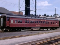 The Montreal section of the westbound Expo Limited included a set-off sleeper for Sudbury on Sunday, August 20, 1967.  SCOTSTOWN was the assigned car on Train 5 that morning.  S-2 7092 cut the car and placed it on a siding to await its return to Montreal at 10.45 that evening.  The CPR's Assignment of Space, Form 62-26, allocated it line number 520.  This was a convenient way to allow passengers to recognize the car in which they were travelling.  The line number appeared in a small box in the window alongside the vestibule.  To assign a passenger to a berth or room within a car, Reservation Desks in Windsor Station and other major terminals would have a cardboard representation of each car on which they would enter reservation or ticket numbers.  Smaller stations would wire or call the Reservation Desk to obtain a reservation for a passenger. <br> <br>

My friend and retired CP employee, Doug Phillips of Calgary, offers the following history of CPR sleeping car SCOTSTOWN.  It was delivered from the Company's Angus Shops in Montreal in July 1930. The steel car body was built by the Canadian Car and Foundry of Montreal, and all the wood finish and interior fittings were completed by the craftsmen at Angus. The wood interior was of finished mahogany with rose flower inlays in the corners of the panels of each upper berth. The car was one of 25 ordered for 1930 delivery and was classified in the "S" series of sleeping cars and named after Scotstown, Quebec. A second order of 25 cars of the same series followed in 1931. The car's arrangement was twelve sections and one drawing room with a men's smoking room and a ladies' room. The first 25 cars of the 50 car order were assigned to the summer only 'Trans-Canada Limited.' Each car was 83' 10 ½" long, and three cars were assigned to each of the seven train sets required for the operation of the TCL, with the remaining four used as guard cars. With the discontinuance of the TCL, the cars were used on the 'Imperial' and' Dominion' trains. Sleeping car SCOTSTOWN would again be used in summer service in 1967 on the EXPO LIMITED and would be retired in October 1968 and subsequently scrapped. <br> <br>   

The image shows the odd-numbered side of the car.  The windows are in the toilet, the next three windows in the men's washroom, six sections eleven through one and three windows in the corridor opposite the three-person drawing room and the women's washroom.   