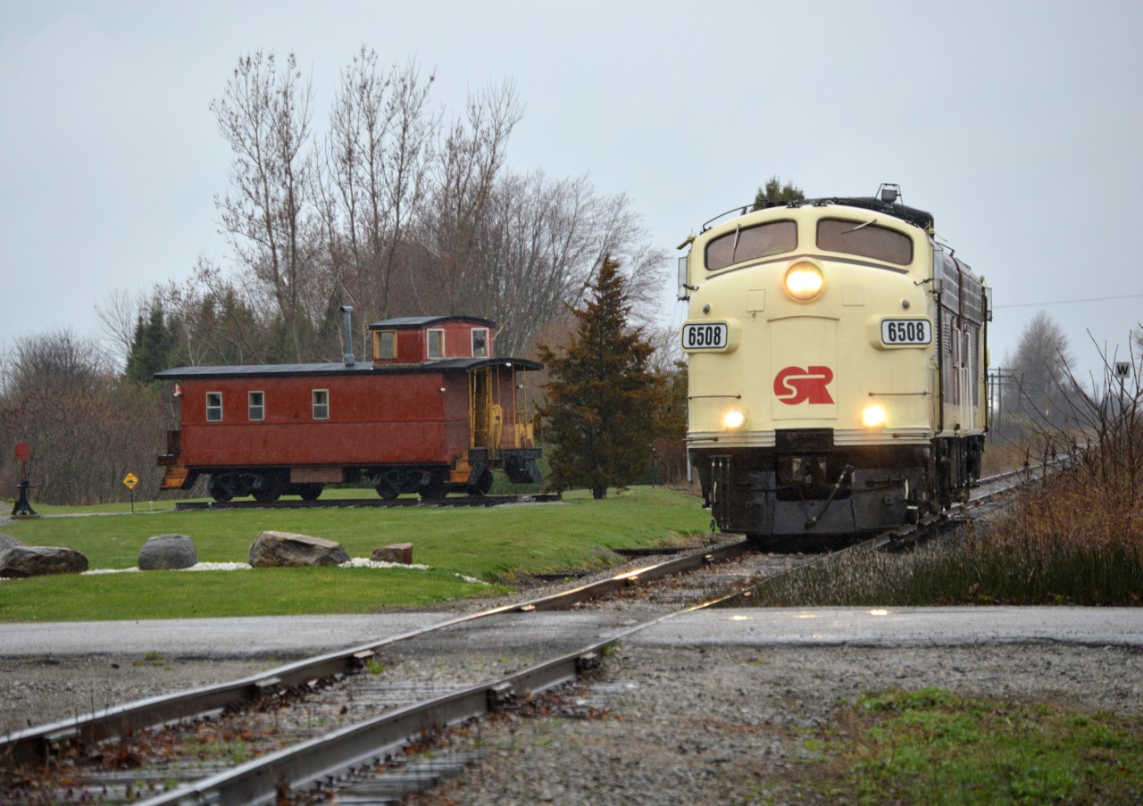The last Cayuga Clipper passes the Caboose along Tower Rd, on its way to Tillsonburg, to take the rest of the cars at IGPC Ethanol in Aylmer and Future Transfer in Tillsonburg. The 2 matching F units where great for the last run on the Cayuga Clipper.
