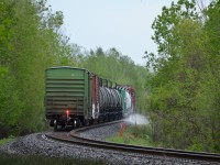 CP WMA-24 is cleaning up the right of way one weed at a time by Mile 86 on CP's MacTier sub, this train usually only operates in dry/daylight conditions but is on a 25MPH run for the yard at MacTier after losing most of the day to equipment problems and a tie program, the race is on and so is the tail end marker ! 