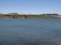 CN 120 with CN 3236, CN 2898 and CN 4711 up front (and CN 3007 mid-train) is crossing the Richelieu River, on its way to Halifax.