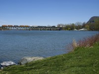 A short SLR 393 crosses the Richelieu River with SLR 804, SLR 3804, QGRY 6904, SLR 3105, SLR 3047 and 27 cars.