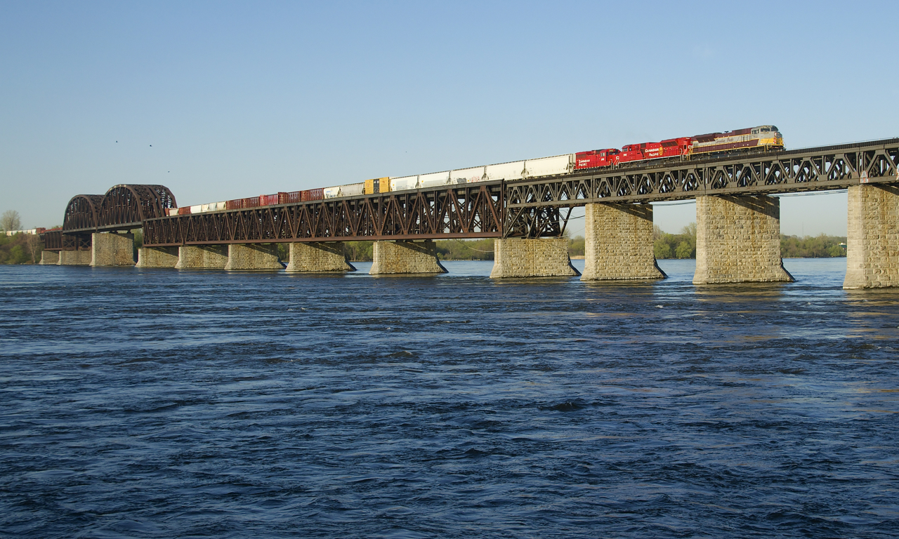 CP 7010, CP 7002 and CP 2253 lead CP 253 over the St. Lawrence River on a gorgeous morning. CP 7010 has led CP 253 a number of times over the past few weeks.
