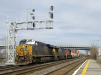 A long CN 327 with CSXT 926, CSXT 5451, CN 8877 and 24 platforms up front is through Dorval.