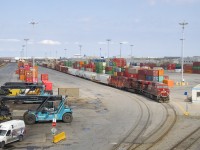 CP 112 with CP 8739 and CP 8541 up front (and CP 8072 mid-train) is slowly entering Lachine IMS Yard. It will do a number of maneuvers, setting off its intermodal cars onto two tracks, putting its mixed freight onto one track so it can grab its DPU and then heading to St-Luc with the three units up front and the mixed freight.