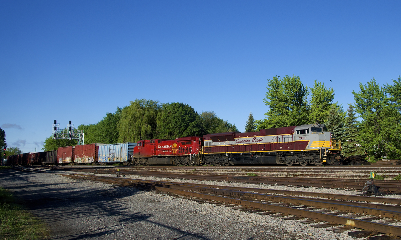 CP 253 has CP 7010 (rebuilt from SD9043MAC CP 9153) and CP 8149 (rebuilt from AC4400CW CP 9619) for power as it passes Lasalle Yard on a very cold morning.