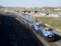 A pair of F59PH's (AMT 1345 & AMT 1343) are the power on EXO 1211 as it passes Turcot Ouest with six multilevel cars. This train is headed to Mascouche on a partially new routing that began this week with the closure of the Mount Royal tunnel for at least three years (it will be completely reconstructed for the REM light rail project).