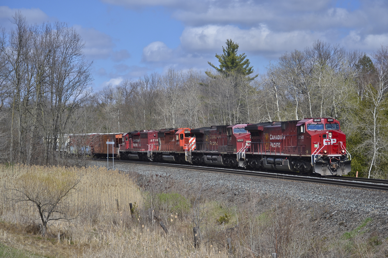 CP 141 finally gets underway after going into emergency due to breaking a knuckle going through Campbellville. I didn't hang around to see how far traffic was backed up on Guelph line, but it must have been a fun wait!