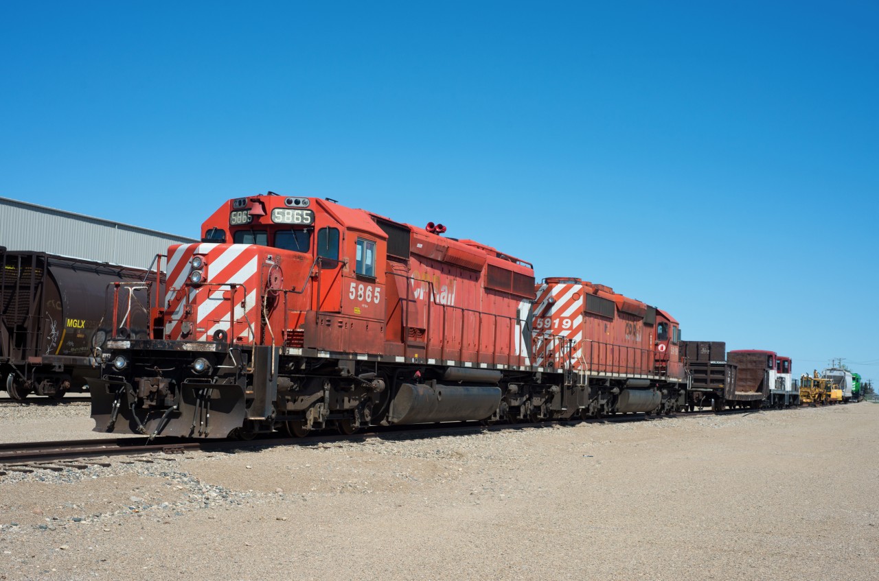 Former CP SD40-2s 5865 and 5919 are seen here at Mobil Grain's shop in Delisle Saskatchewan. I'm still not sure if Mobil Grain purchased these units or is just doing work on them. exCP 5954 could also be seen on the property.