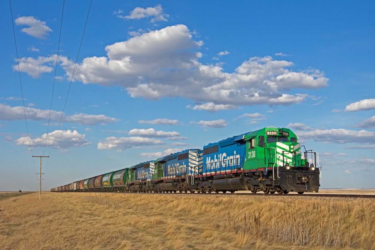 Big Sky Rail works westward through the "land of living skies" just east of Hughton Saskatchewan Canada.