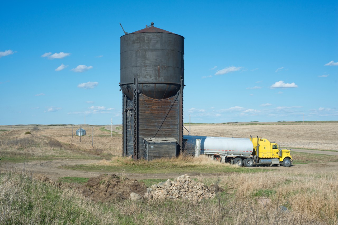I'm standing where, up to the mid 1980s, the CN Dodsland Subdivision passed through Ruthilda Saskatchewan. Grand Trunk Pacific first laid rails through here in 1912 and the water tower was constructed shortly there after. Today the water tower still serves the surrounding community.