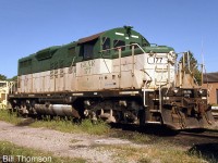 Goderich-Exeter Railway GP9 177 "Titania" is pictured at Stratford on August 26th 2002. This unit was originally built by GMD in 1960 as Quebec Cartier Mining 1 (later renumbered 51). When retired, it was sold to Intermoutain Western Railroad in the US (whose tan and green paint scheme it wears). It found its way onto the GEXR in the early 90's with three other ex-Cartier sister units 178-179-180 for the startup of GEXR, and operated into the 2000's until it was parked out of service around 2004, and eventually scrapped in 2008.