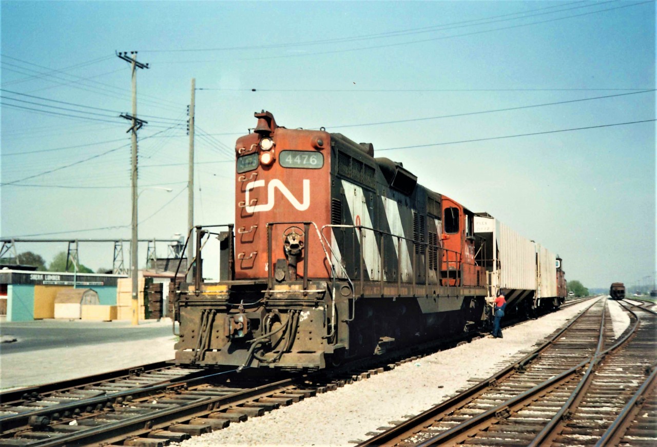 The CN Nickel Yard is mostly empty this day.  Curiously enough the power out of Niagara Falls consisted of (2) GP 9's, 4476 and 4533.  The crew choose to separate the two locomotives and leave 4533 parked at the east end of the yard, and use only 4476 for switching operations. They would soon depart with the two covered hoppers for Government Elevator (Port Colborne Grain Terminal) on the south west harbor side. Today the train would be sitting on the Friendship Trail Bike Path that links Port Colborne with Fort Erie on the former CN Dunnville Subdivision (Buffalo, Brantford, & Goderich) line from the mid-1850's.