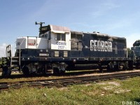 Georgia Southwestern GP7u 2127 is pictured on the Goderich-Exeter Railway at Goderich in August 2002. 2127 started out as one of many of Santa Fe's GP7 units, and was later rebuilt with a "Topeka cab". After being sold off and working on GSWR, it arrived on the GEXR in 1997 where it operated in GSWR colours. After a few years of being out of service, it was scrapped in September 2008 with a number of other old GEXR units.