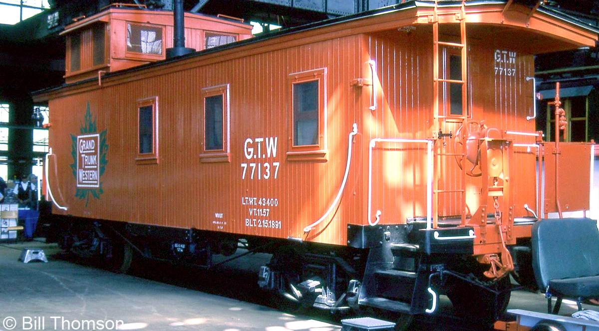 Another piece of equipment on display at the Elgin County Railway Museum during their Railway Days was their restored Grand Trunk Western caboose, tucked away inside the museum's old Michigan Central RR shop building. 

GTW 77137 was originally built as Chicago & Grand Trunk 90724 by the GTR's Port Huron shops in 1891. The Canadian Trackside Guide shows it as donated and residing at the Bayview Museum in Sarnia from 1964-1974. It was reloacted to the Canadian Railroad Historical Association (Toronto & York Division) Canadian Railway Museum on the harbourfront in downtown Toronto near Queen's Quay and Bathurst, that opened in May 1975. When the harbourfront railway lines were removed from that area in the mid-late 80's, the equipment was removed and stored nearby in 1987 (some pieces found other homes, others were damaged by vandals, some were scrapped). The caboose was then moved to the Smiths Falls Railway Museum from 1990-1998 under private ownership, and eventually to the ECRM in St. Thomas where it resides today.