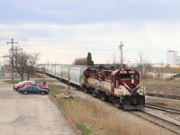 A pair of RS-18u's in OSR 181 and OSR 182 are working to switch PDI industries as they back up to hook on to the remainder of the train sitting on the siding. The OSR's varying array of older power is a nice change to the standard GE power of the main lines. Everyone better get your shots in soon as the OSR could soon be a thing of the past in Guelph by the end of June.