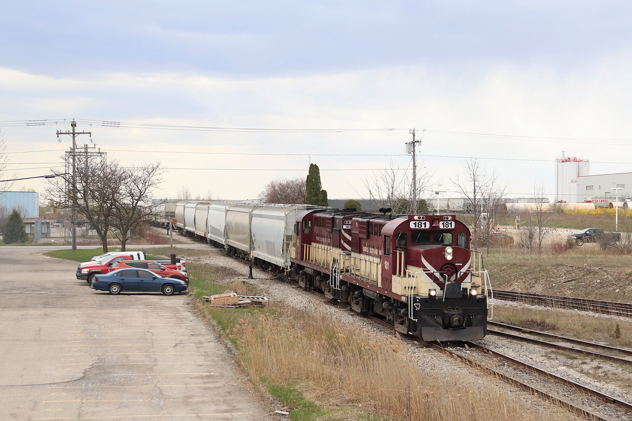 A pair of RS-18u's in OSR 181 and OSR 182 are working to switch PDI industries as they back up to hook on to the remainder of the train sitting on the siding. The OSR's varying array of older power is a nice change to the standard GE power of the main lines. Everyone better get your shots in soon as the OSR could soon be a thing of the past in Guelph by the end of June.