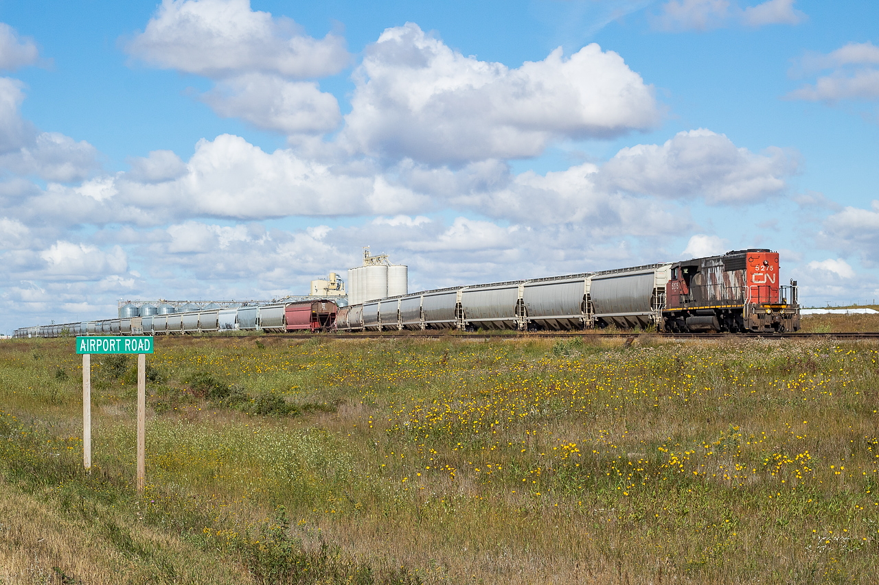 CN L501, with the 5275, drills the yard in Biggar on a lovely August morning in Saskatchewan. The facility in the background is Prairie Malt. I'd later find 501 out near Oban, with a lone hopper in tow.