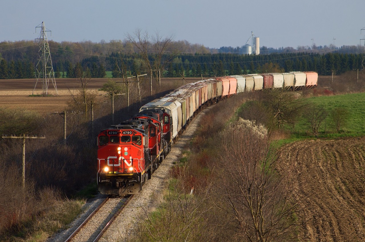 After working Agromart CN 568 heads back east towards Stratford with a classic quartet of EMD Geeps.