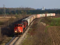 After working Agromart CN 568 heads back east towards Stratford with a classic quartet of EMD Geeps. 
