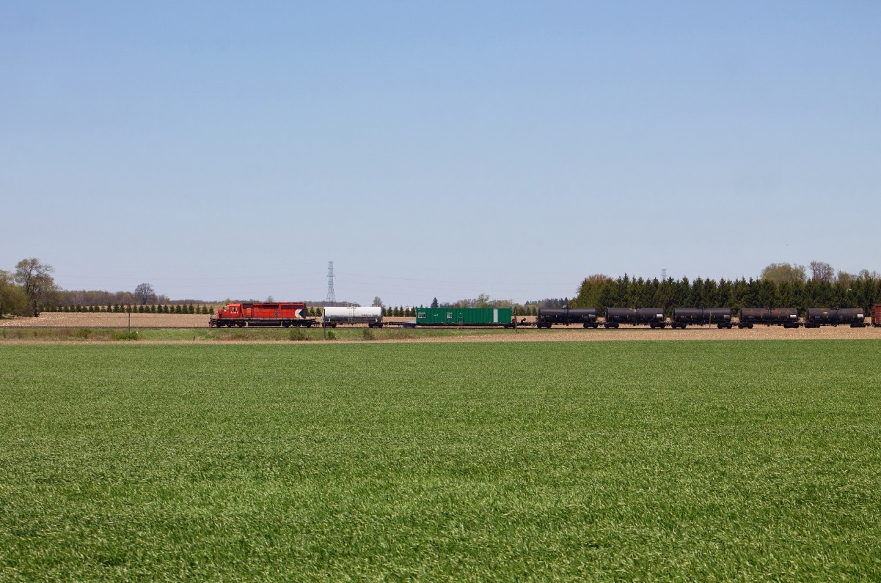 The CP spray train charges west through the farmland just outside of Thamesford.
