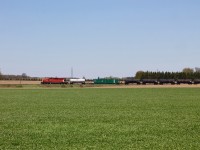 The CP spray train charges west through the farmland just outside of Thamesford. 