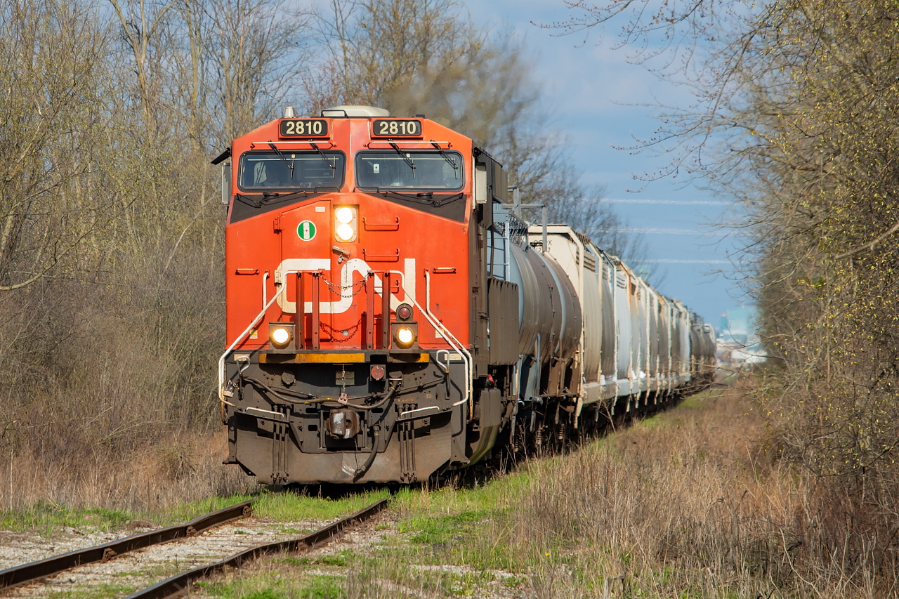 I've said it before, and I will say it again, I don't mind solo GEVOs so much, especially when they're in somewhat novel situations. The 2810 is solo here, wobbling its way down the Chemical Spur back to Port Rob after lifting Oxy Vinyls. A thanks to Mark for the heads up on this one. I was down in Fort Erie shooting the Wabash when CN went over to Oxy and I made it just in time for the return trip. In all my excursions to Port Rob I had yet to ever see this move (as it is normally handled at night by 564), so it was greatly appreciated.