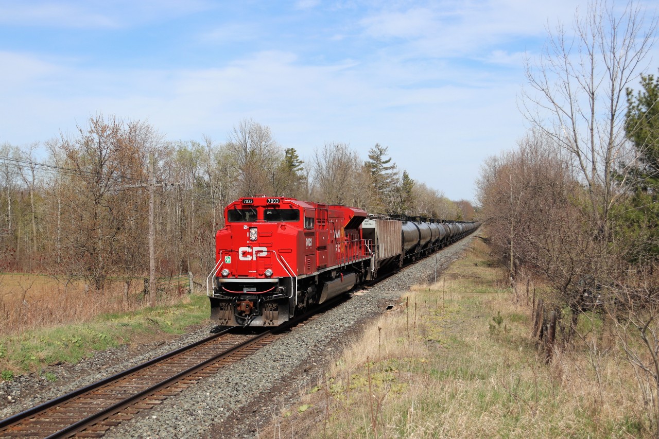 The leader of CP 650 was a plain jane CP 8908 but the rear DPU proved be something different. One of the rebuilt SD70ACu's in CP 7033 provides the push from the rear as it passes mile 43.2 on the Galt sub. Perfect sun, perfect paint, proper time, once again we get lucky. Seeing anything lately on this section of the Galt sub is something, so this made my day.