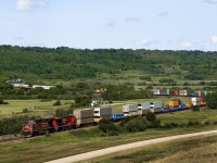 Edmonton to Toronto train 104 operating on CP's north line crosses the Assiniboine River valley on the tortuous Bredenbury Sub. with 3 valley crossings, Little Saskatchewan at Minnedosa, Birdtail at Birtle and the Assiniboine west of Binscarth. The Little Saskatchewan and Assiniboine involve 2% grades dubbing the subdivision Manitoba's mountain railroad. At the time CP couldn't make up its mind to operate this train via the north line or via Calgary and the main.  