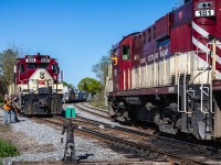 Ontario Southland’s days in the Royal City may be numbered, but it’s business as usual as a pair of trains meet at ‘Lower Yard’ on this gorgeous spring afternoon in Guelph, Ontario.