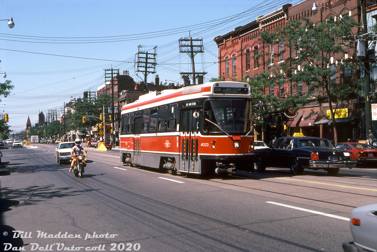 Back when the fledgling CLRV fleet was still relatively new on the Toronto transit scene, TTC CLRV 4023 heads eastbound on a Rt.506 Carlton run along the busy College Street, passing Major Street in traffic on a sunny afternoon in September 1983. Despite operating with front and rear couplers, the cars were never used in service as MU sets, and eventually the couplers were removed and replaced with front skirt pieces.

William Madden photo, Dan Dell'Unto collection slide.