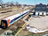 In September 1996, VIA Rail had launched the testing of two IC3 Flexliner demonstrator sets on some of their routes throughout Ontario. These new units were designed and built by ADtranz, which was a new company spin-off created from ABB and Daimler-Benz. These two trainsets entered revenue service on September 29, as it was concurrent with the release of the new VIA Rail system timetable that touted the trains as a “commuter service.” However, just as quickly as they began service they were removed on September 30 as they were found to not be reliably activating track circuitry due to their light weight. Eventually, after 7 weeks of further testing and modifications they were deemed fit to return to service where they operated on assignments from Toronto to Ottawa, Stratford, London and Niagara Falls in various schedule rotations. One set would operate until March 1997 and the other stopped running in early May. In the end, the tests were reportedly not successful and VIA Rail felt the technology would not “fit their needs.” Here, one of the sets is seen stopped at the Woodstock station on the CN Dundas Subdivision with not many passengers around as it heads eastbound from London.