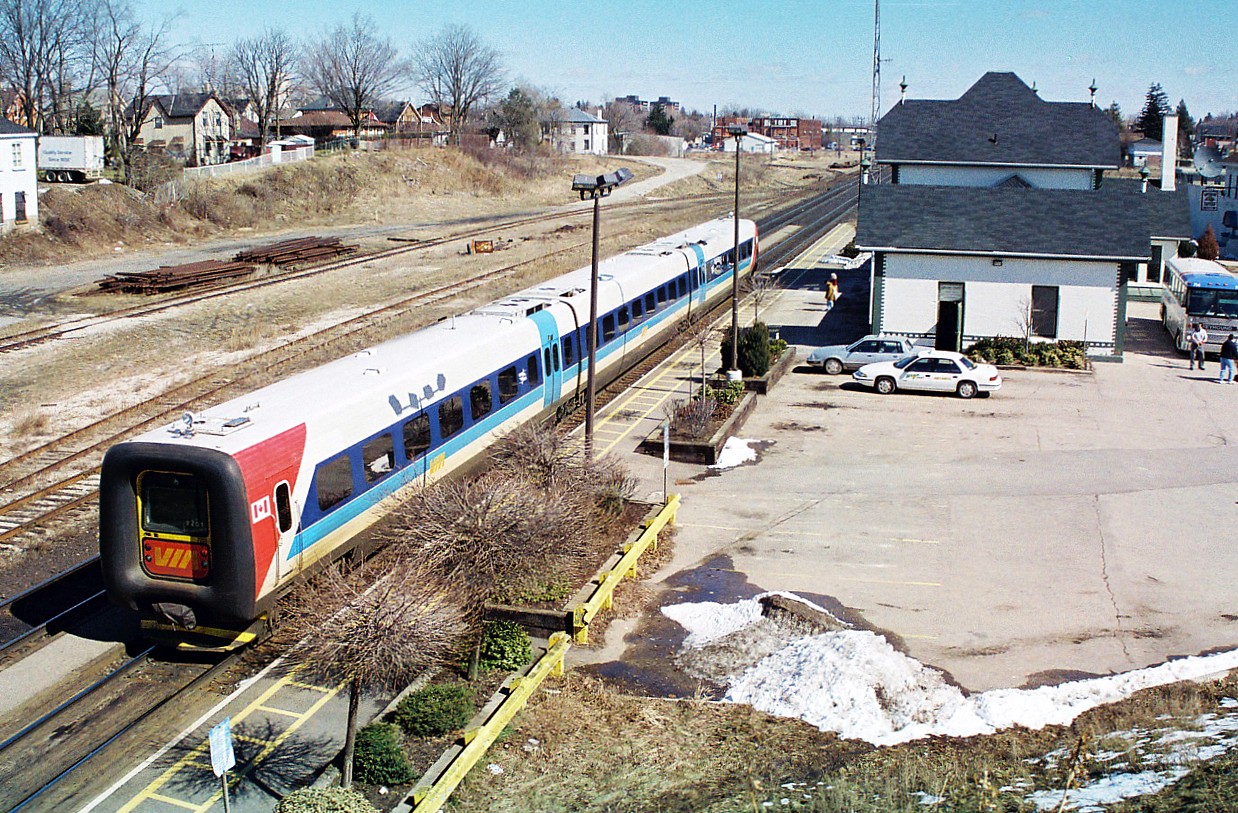 In September 1996, VIA Rail had launched the testing of two IC3 Flexliner demonstrator sets on some of their routes throughout Ontario. These new units were designed and built by ADtranz, which was a new company spin-off created from ABB and Daimler-Benz. These two trainsets entered revenue service on September 29, as it was concurrent with the release of the new VIA Rail system timetable that touted the trains as a “commuter service.” However, just as quickly as they began service they were removed on September 30 as they were found to not be reliably activating track circuitry due to their light weight. Eventually, after 7 weeks of further testing and modifications they were deemed fit to return to service where they operated on assignments from Toronto to Ottawa, Stratford, London and Niagara Falls in various schedule rotations. One set would operate until March 1997 and the other stopped running in early May. In the end, the tests were reportedly not successful and VIA Rail felt the technology would not “fit their needs.” Here, one of the sets is seen stopped at the Woodstock station on the CN Dundas Subdivision with not many passengers around as it heads eastbound from London.