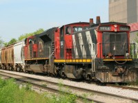 CN 1444 and 8916 create a real beauty and the beast consist at Kitchener. Both are waiting to be lifted by the next A431. CN 1444 was the last GMD1u to be assigned to Kitchener and is also the highest numbered in the series. 