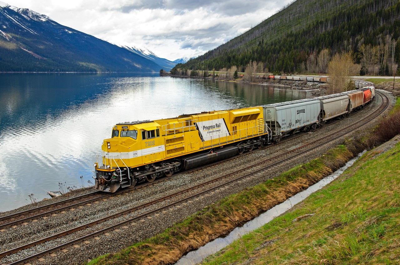 EMDX SD70ACe-T4 7202 leads CN train X310 east along the shores of Moose Lake on CN's Albreda Sub. Two of these units are currently demonstrating on CN's system (the other being #7201).