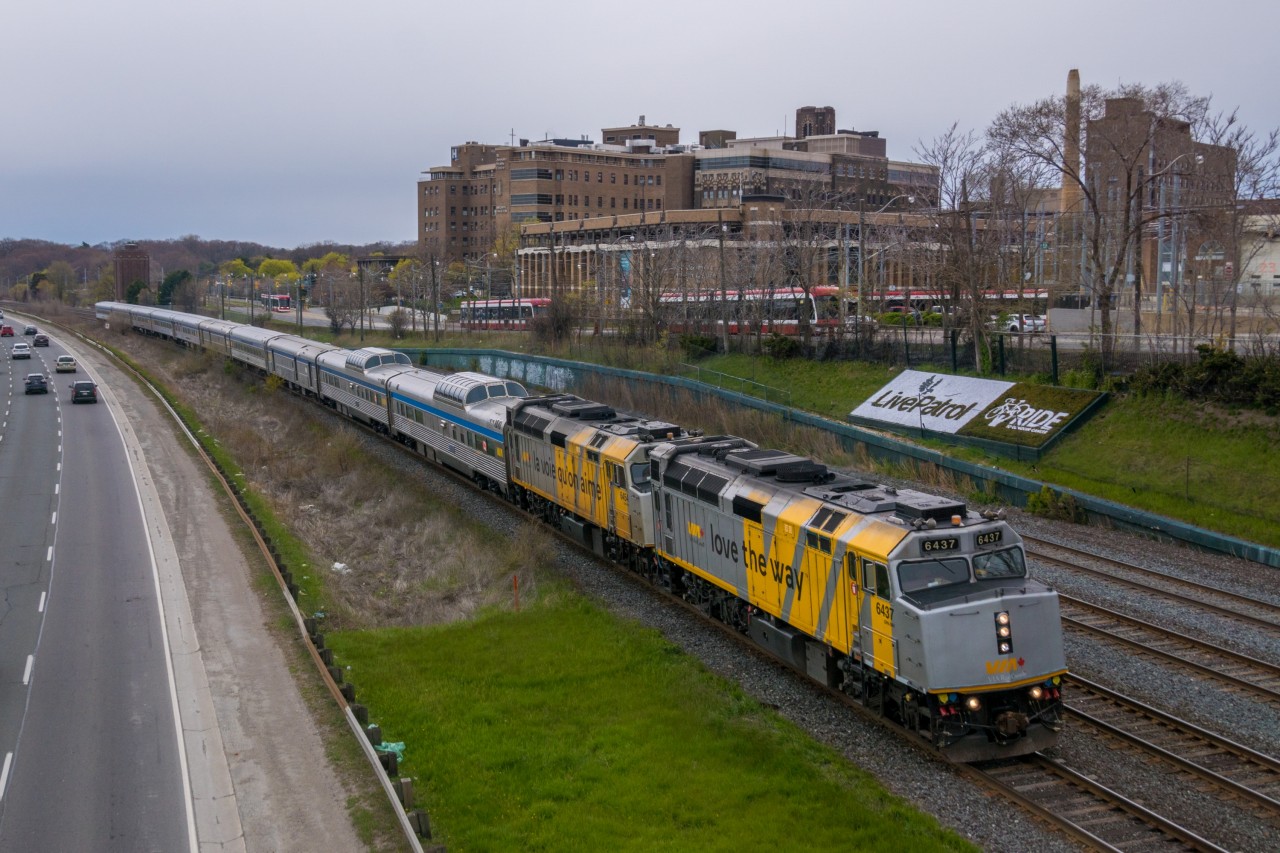 With COVID-19 service reductions, there are only a few VIA trains per day. In position for some equipment heading to Union Station before a trip to Montreal or Ottawa, VIA 11 showed up. It would be heading straight through the USRC and up the Bala Sub. Having been turned on the turntable since  yesterday's arrival on VIA 63, VIA 6437 was now leading 6454, showing VIA's great slogan in both official languages. In addition to the engines, the last 7 cars came from Montreal the day before, while the first 3 had been in Toronto. Reportedly, the two skylines, two baggage cars, two chateaux and four coaches will make up consists for Winnipeg to Churchill trains, allowing for the currently-running equipment to be cycled out for inspection and repair. This train wasted no time, only waiting momentarily for signals onto the Bala Sub, and I just barely managed to catch it at Oriole.