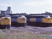 Who's on third?  A trio of VIA FPA-4's 6765-6789-6769 await their next assignment at the Spadina roundhouse in downtown Toronto on August 4th 1982. The approximate location of third base at Skydome, er sorry, I mean Rogers Centre today. 