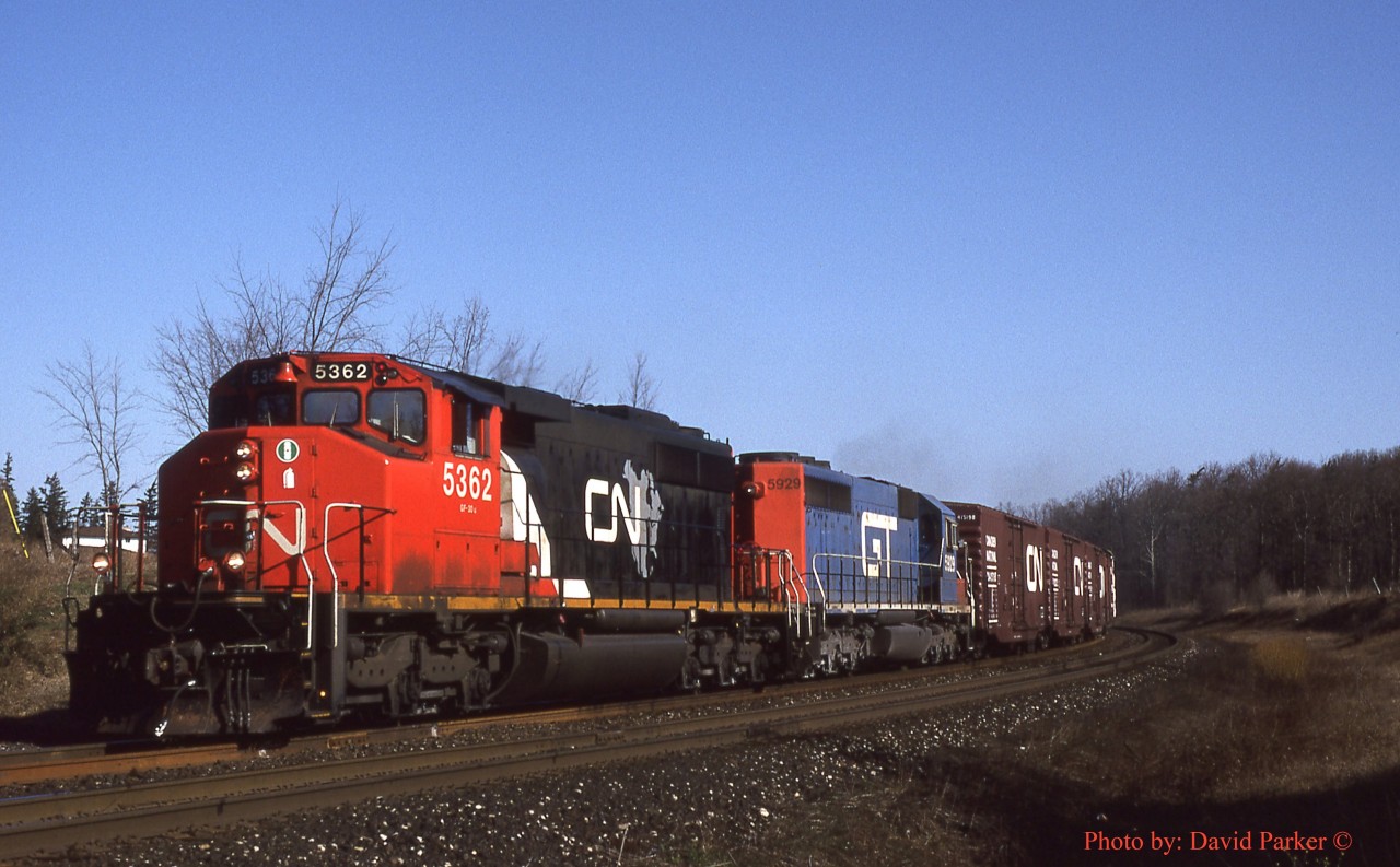 Clean CN SD40-2W 5362 & GTW 5929 wheel a Westbound on the North Track of the Halton Sub between Ash and Tansley