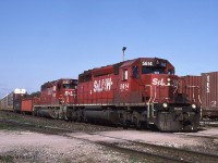  A pair of STL&H SD40-2's (5614-5993) head train #138 through Guelph Jct, Ont on Aug 18th 2002. 