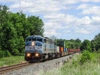 CP 9-143 rolls into Toronto with a consist that hasn't been seen on the CP Belleville sub in a good 5 years or more. CMQ (Ex-CP) SD402-2Fs 9020 and 9022 pull 111 intermodal wells and autoracks from Montreal to Toronto. I never thought I would get a chance to see these locomotives, let alone leading and no CP red. 