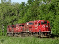 CP 244 waits patiently for a light to proceed eastbound at Leaside. CP 8524 leads, but due to lighting, a good shot was not possible. But CP 3033 was nose out, and there were no cars on this train, the illusion of CP 3033 leading can be made. CP 8524, CP 6260, CP 8512, CP 3033 are on the power move to Toronto.