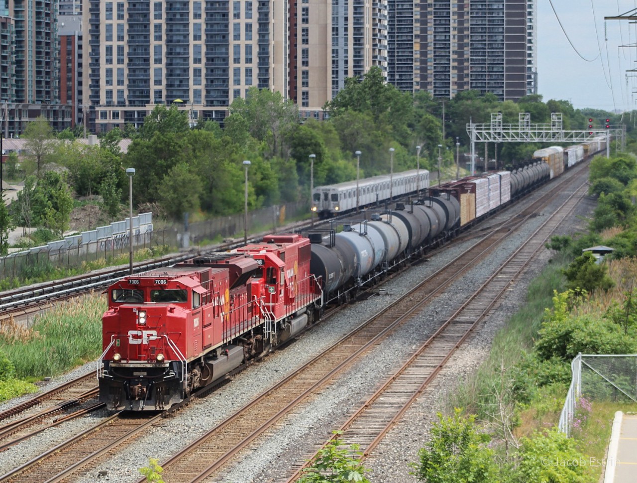 Here we have CP 7006 leading 246 down the Galt. Leading of course is a beautiful red ACU and trailing second is a SD60 numbered 6308. Both were facing forward which is a little unusual for this train.