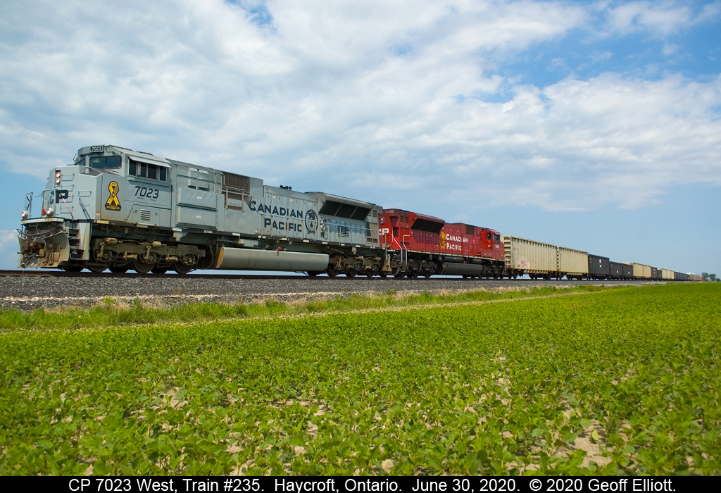 CP train #235 sits quietly between St. Joachim and Haycroft, Ontario on June 30, 2020.  Due to issues at the Norfolk Southern Bridge over the Rouge River in Detroit, all traffic to/from the CP/NS has been stopped all day.  235 sits here with 10K feet of train while a 141 sits in Windsor ahead of him with 9100 feet of train.  With no place to go where they will fit, all they can do is sit.  Also in the mix is a 140 on the U.S. side, west of NS Bridge, with CP 7016 and mid-train DPU 6644.  Just another day of "Precision Railroading" on the CP in 2020!!!