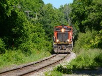 CN’s run from Kitchener Yard down to the CP interchange on the Huron Park Spur tends to be random and that randomness can be great at times, as seen in the photo. Around 0830 hrs, 540’s crew was on duty and was chatting with Montreal to receive orders on what 542 will be doing later that day and what power they’ll be taking. As they were speaking, they had a 13 car train of scrap (I believe going to Russel Metals at Hagey on the CP) and a few covered hoppers built on the west end of Kitchener with 1408 leading GMTX 2279, 7025, and 4790. They pull up to the station on the siding track and waited for their light to proceed onto the main track at Kitchener West and back down the main and pull down the Huron Park Spur and as they were waiting, 540 calls up Montreal once again and says something along the lines of “Metrolinx ain’t connecting to our call for our light, conductor is in the office trying to get a hold of them and nothing is going through”. Interesting, they specified they needed only the light to back down the main from the siding to get to the Huron Park Spur switch at Sturm so they were running 1408 in decent light down to the CP interchange no matter what. Light’s only getting better longer they sit as well. Finally Metrolinx answered and gave them their light to do what they needed to do but I did not hear if Metrolinx responded to why they weren’t answering. An interesting morning led to a great scene as 1408 comes down the Huron Park Spur approaching Queen Street on the former GRNR in the sweet morning light. They then will set-off their train at South Junction and proceed back up to Kitchener light power due to track restrictions after 10:00 hrs. 542 then took this unit with the GMTX 2163 to service the N Guelph Spur so this movement definitely caught my satisfaction as the power was separated.  