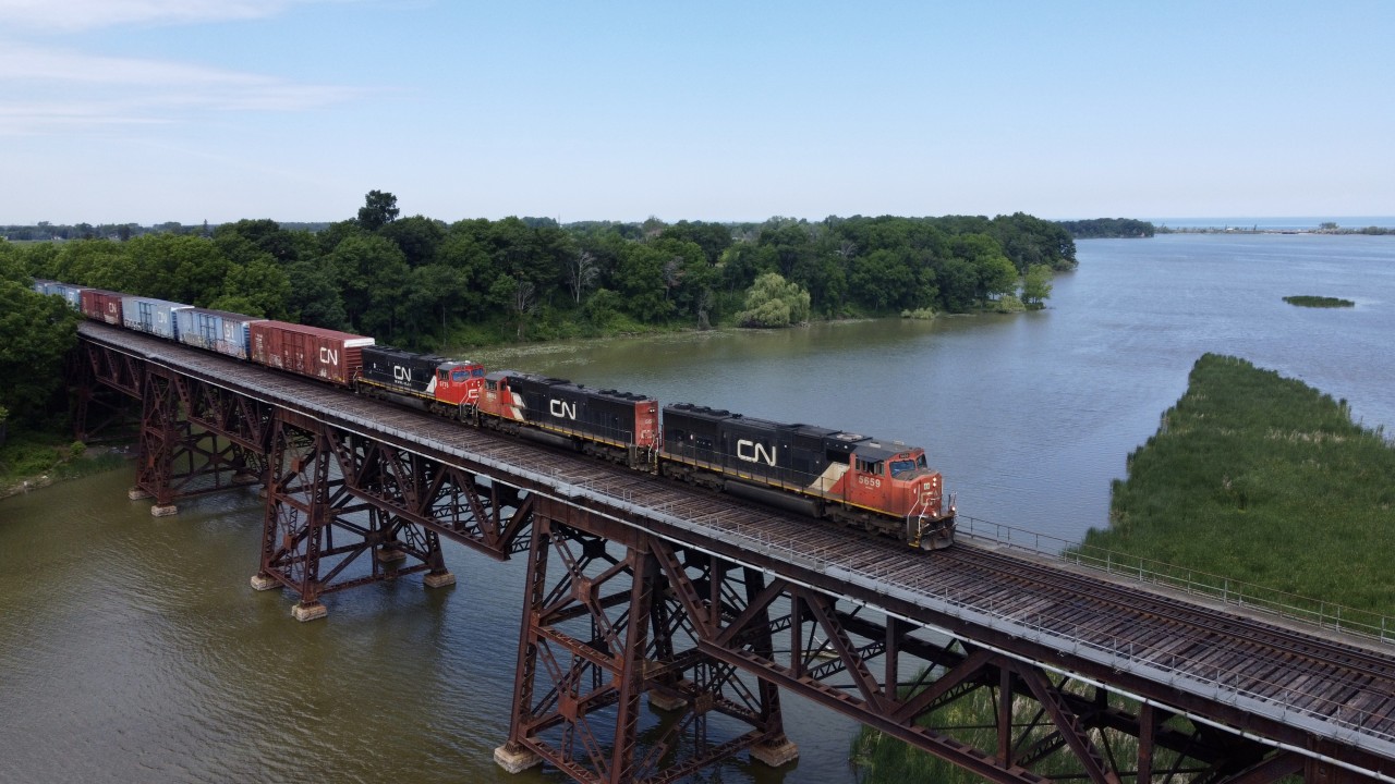 Eastbound CN 421 creeps across the bridge spanning Jordan Harbour, ready for a rolling meet with counterpart 422 just on the other side.