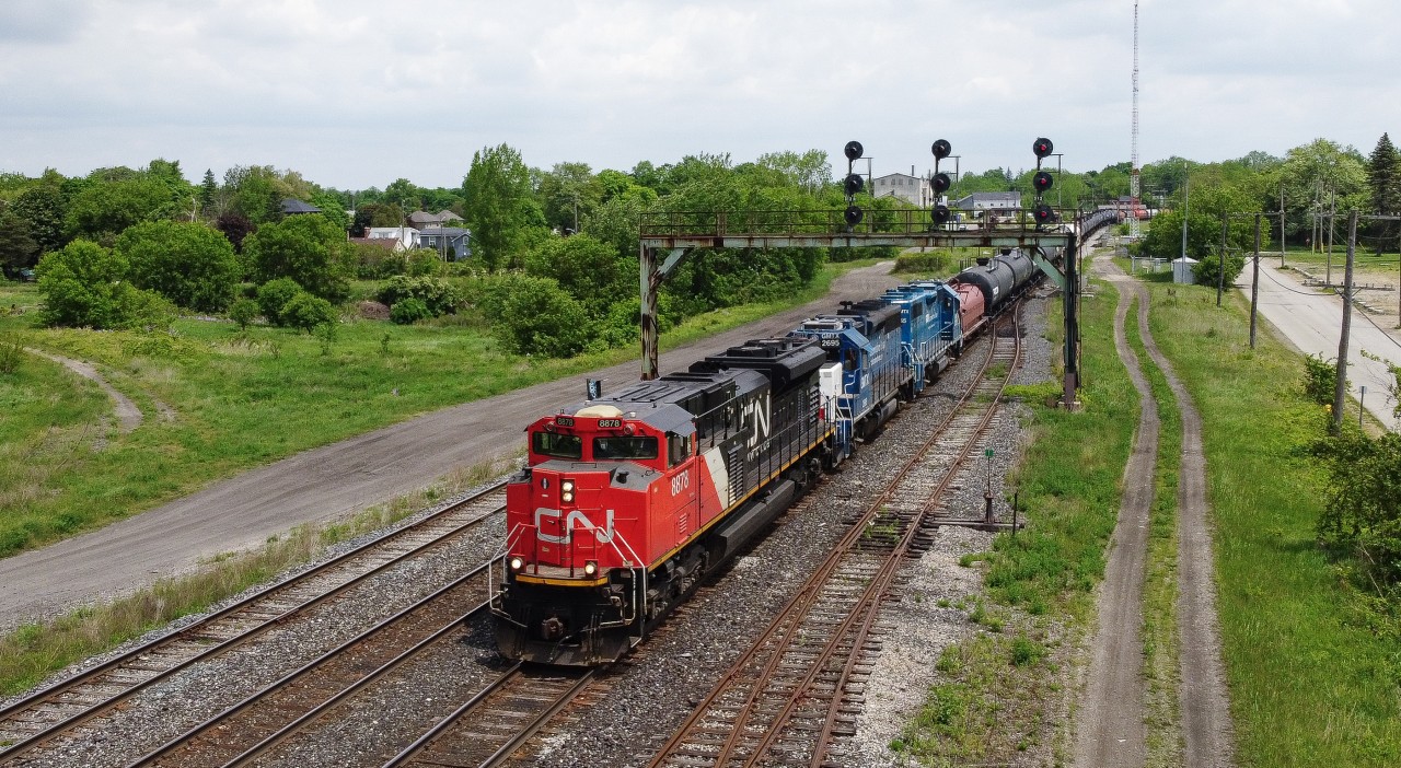 CN 580 arrives at Paris Junction behind CN 8878, GMTX 2695 and GMTX 2255.  They had to taxi out to Garnet that morning to rescue train 581 that had run out of hours on the Hagersville Subdivision.  They would later run to CGC and back as well, making for a long day for the 580 crew.