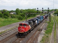 CN 580 arrives at Paris Junction behind CN 8878, GMTX 2695 and GMTX 2255.  They had to taxi out to Garnet that morning to rescue train 581 that had run out of hours on the Hagersville Subdivision.  They would later run to CGC and back as well, making for a long day for the 580 crew.