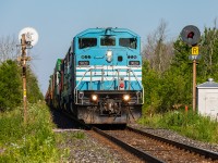 The Barns are back! For how long, who knows. Nonetheless, it's pretty incredible seeing these ol' girls singing out their inevitable swan song on original home rails. After CP 8013 lost function of its horn somewhere in Eastern Ontario, CMQ 9020/9022 were pulled from a work train and tacked on at Smiths Falls. Now leading one of the hottest trains on the road, venerable SD40-2F 9020 is seen splitting a pair of CN searchlights as it races towards Buffalo with train no. 143 at Fort Erie, Ontario.